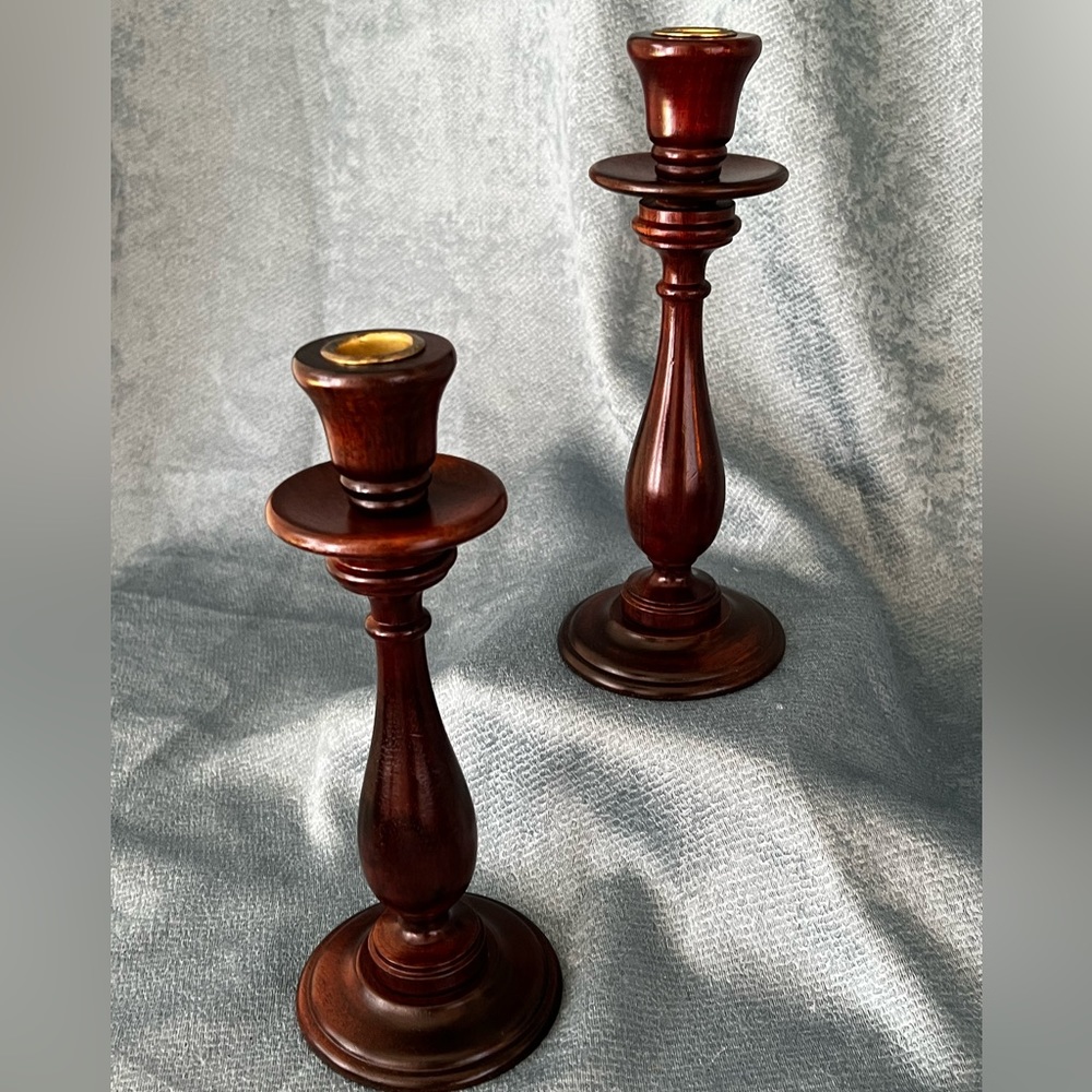 Elegant, mahogany candlestick holders. They retail for $160 elsewhere.
